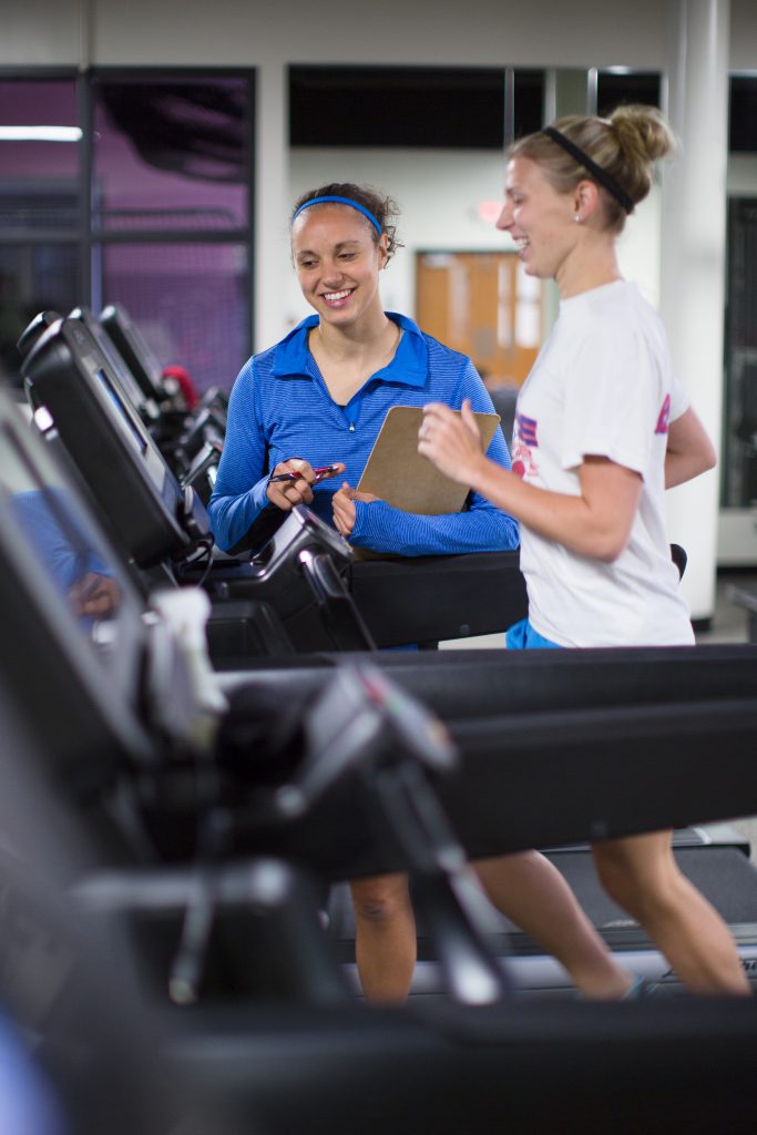 Students working out on treadmill in the G Rec