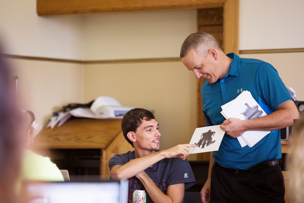 Student with professor with psychology degree