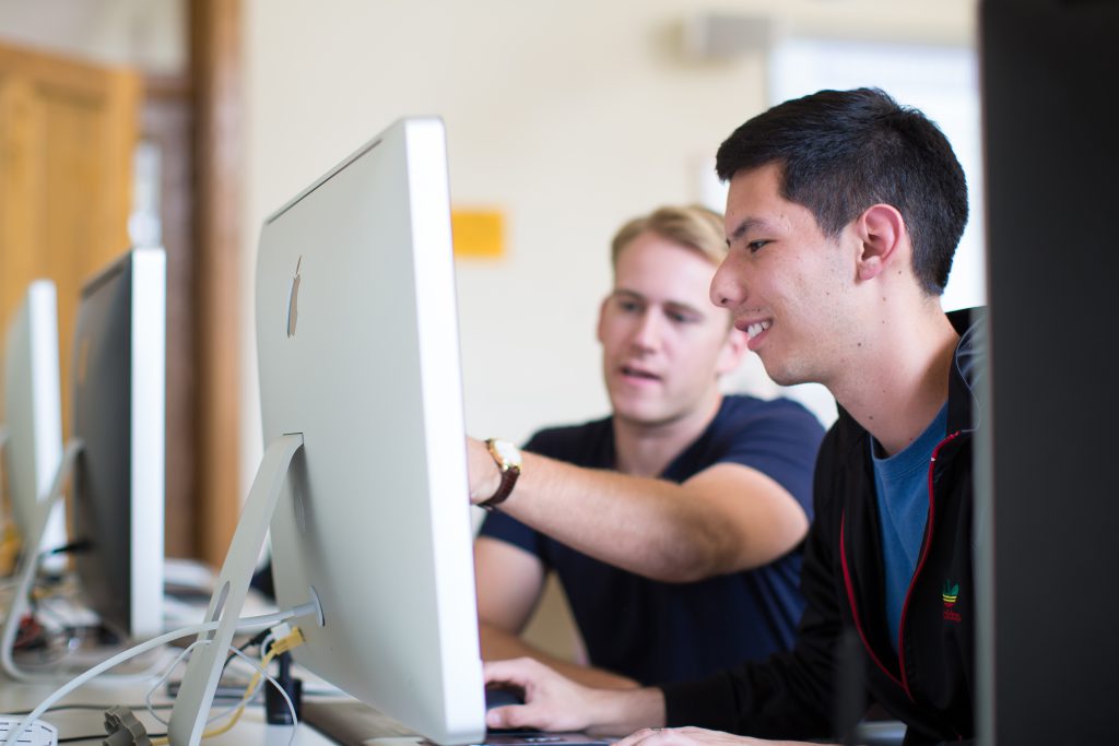 Students in class in mac lab