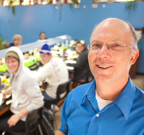 Life Science professor in lab with students