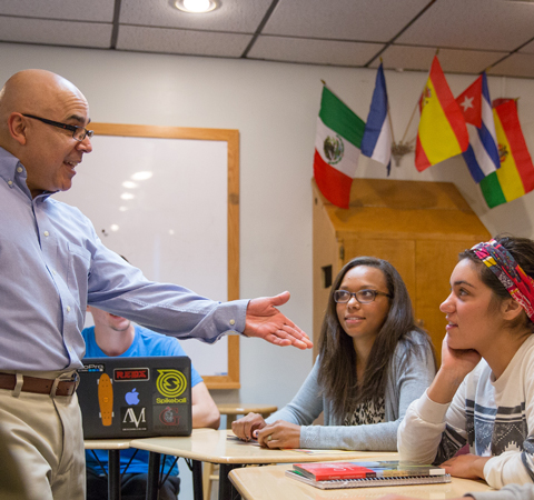 Spanish professor speaking to students in class