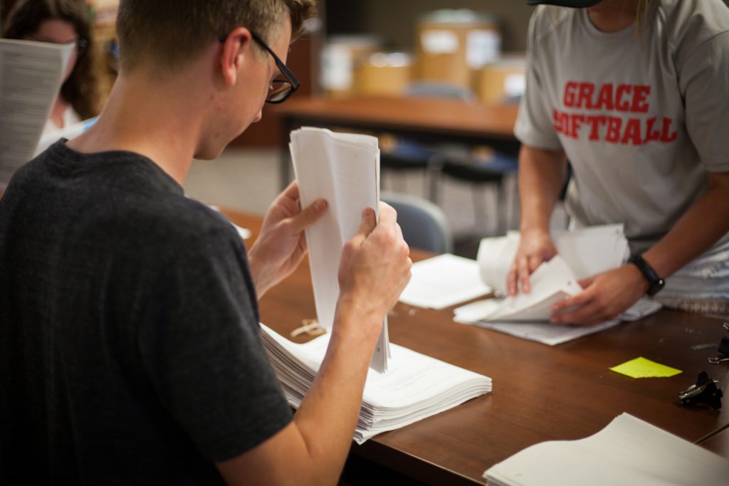 Students organizing papers