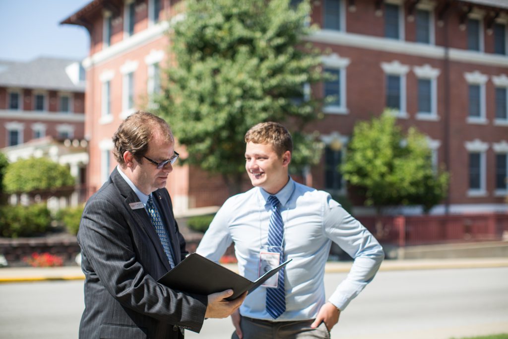 Professor with student outside