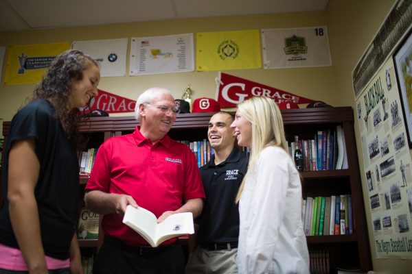 Students with professor in office