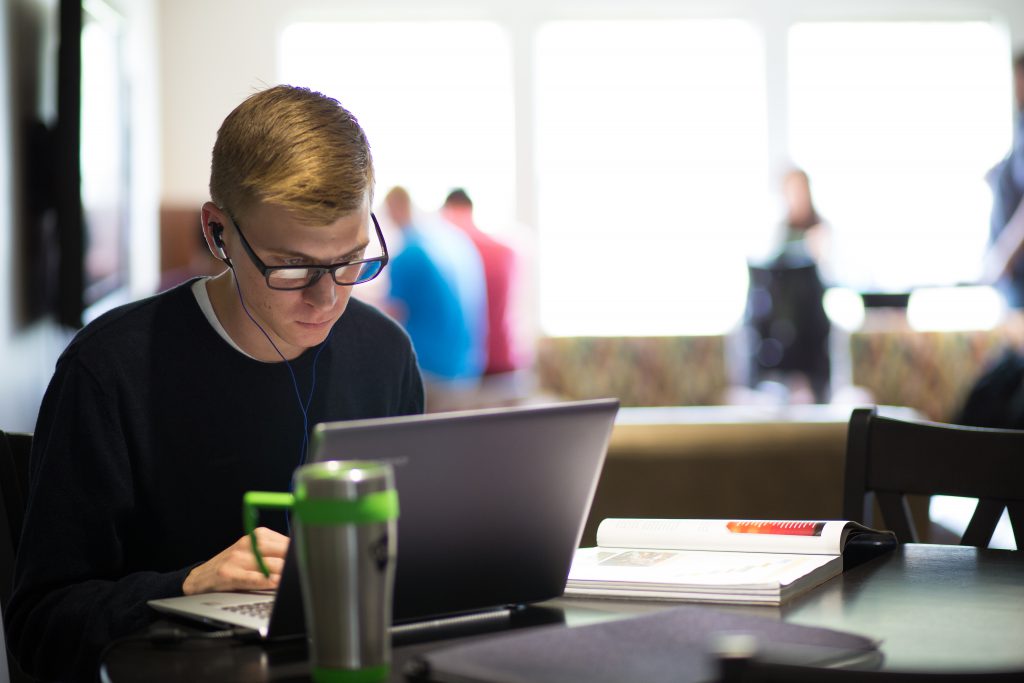 Student working on a laptop