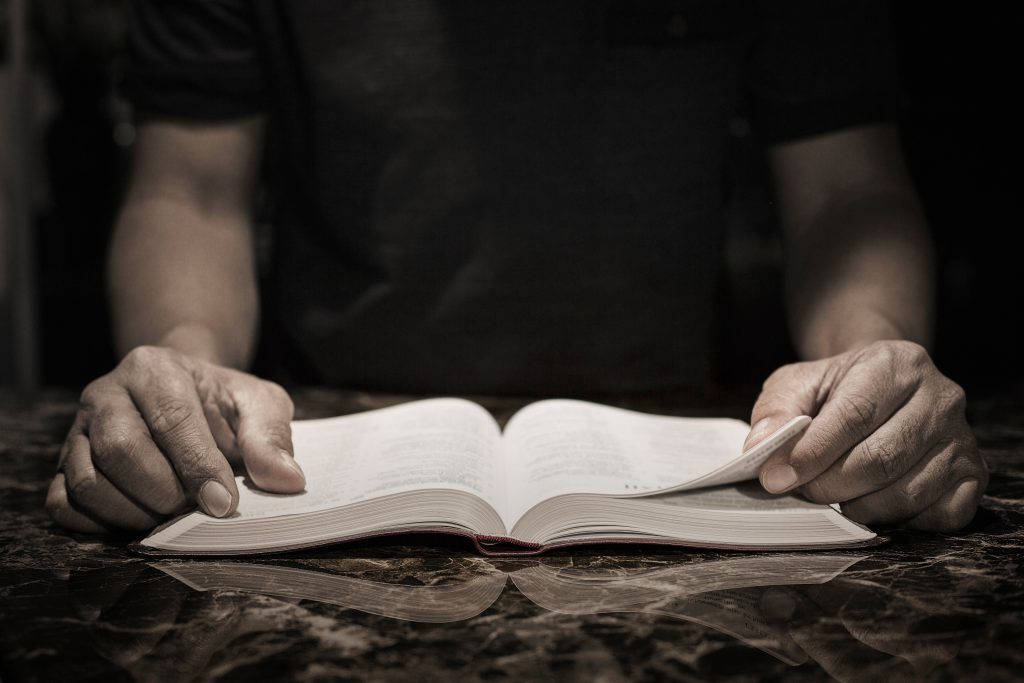 Man reading the bible