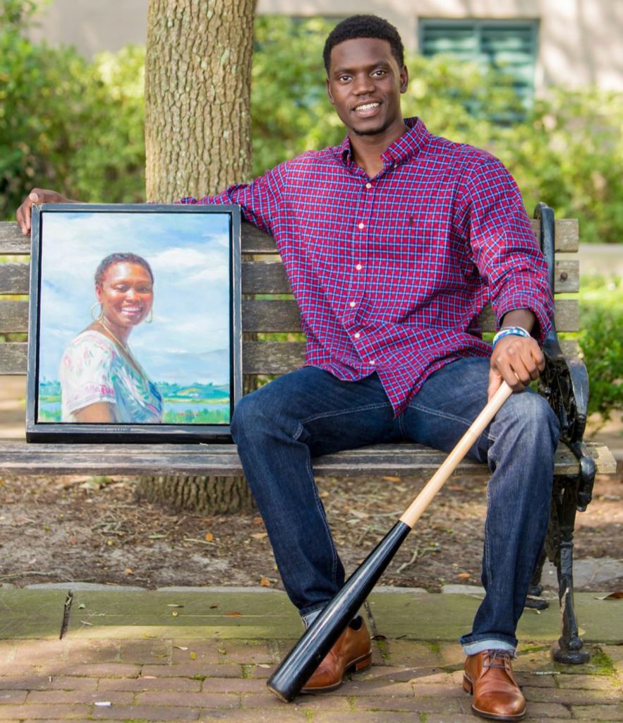 Chris Singleton sits on a bench