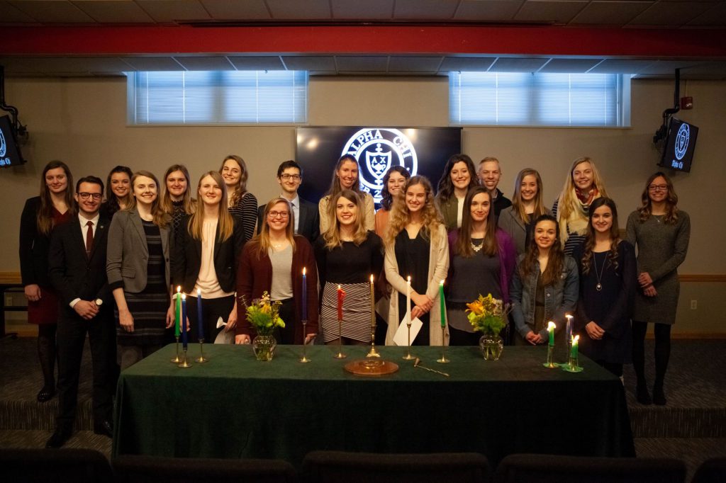 Grace faculty and administrators gather to welcome the newest members of the Indiana Gamma Chapter of Alpha Chi National Honor Society.