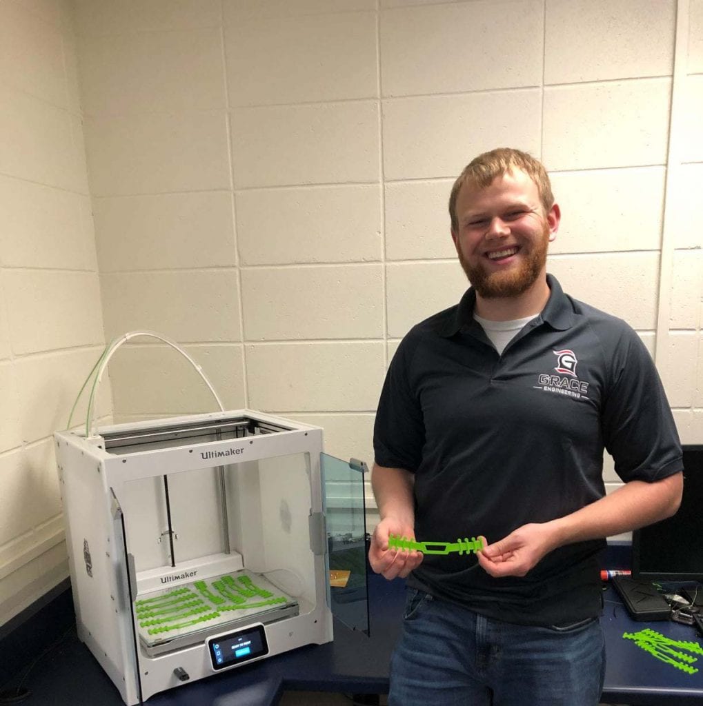 Grace College engineering students Erin Lawhon and Abbott Joy are 3D printing ear guards to donate to local organizations