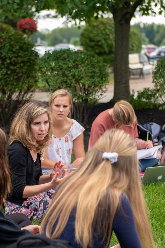 Not All Learning Happens in a Classroom Dr. Fawcett converses with a student. The big world to which you are entering is not contained in a classroom setting. This is why many professors offer lunch options. They can be found in campus dining, engaging with their students outside of the classroom. The old adage is true. People don't care how much you know until they know how much you care. Grace professors understand that caring is most often communicated in that which isn't expected. Opening their homes to host a movie discussion in a relaxed setting. Office hours that happen outside on a beautiful day. Stopping to pray for a need outside the context of the class subject. To teach business principles in an interactive way, professors have brought several copies of the board game Monopoly. No information was found about whether the Star Wars or Pokémon editions were used. But we trust learning was fun on that day.