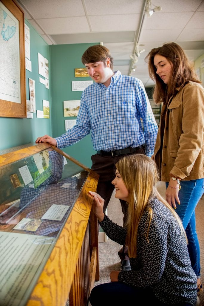 Dr. Norris with Students in History Center