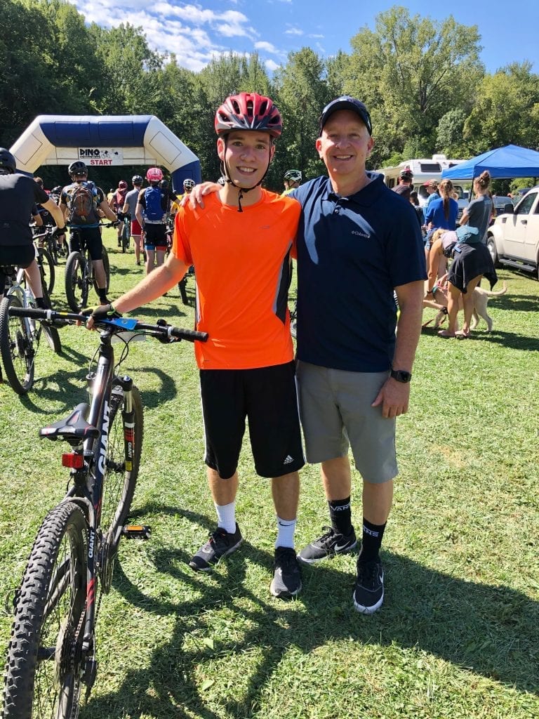 David Schramm with Dad mountain bike riding