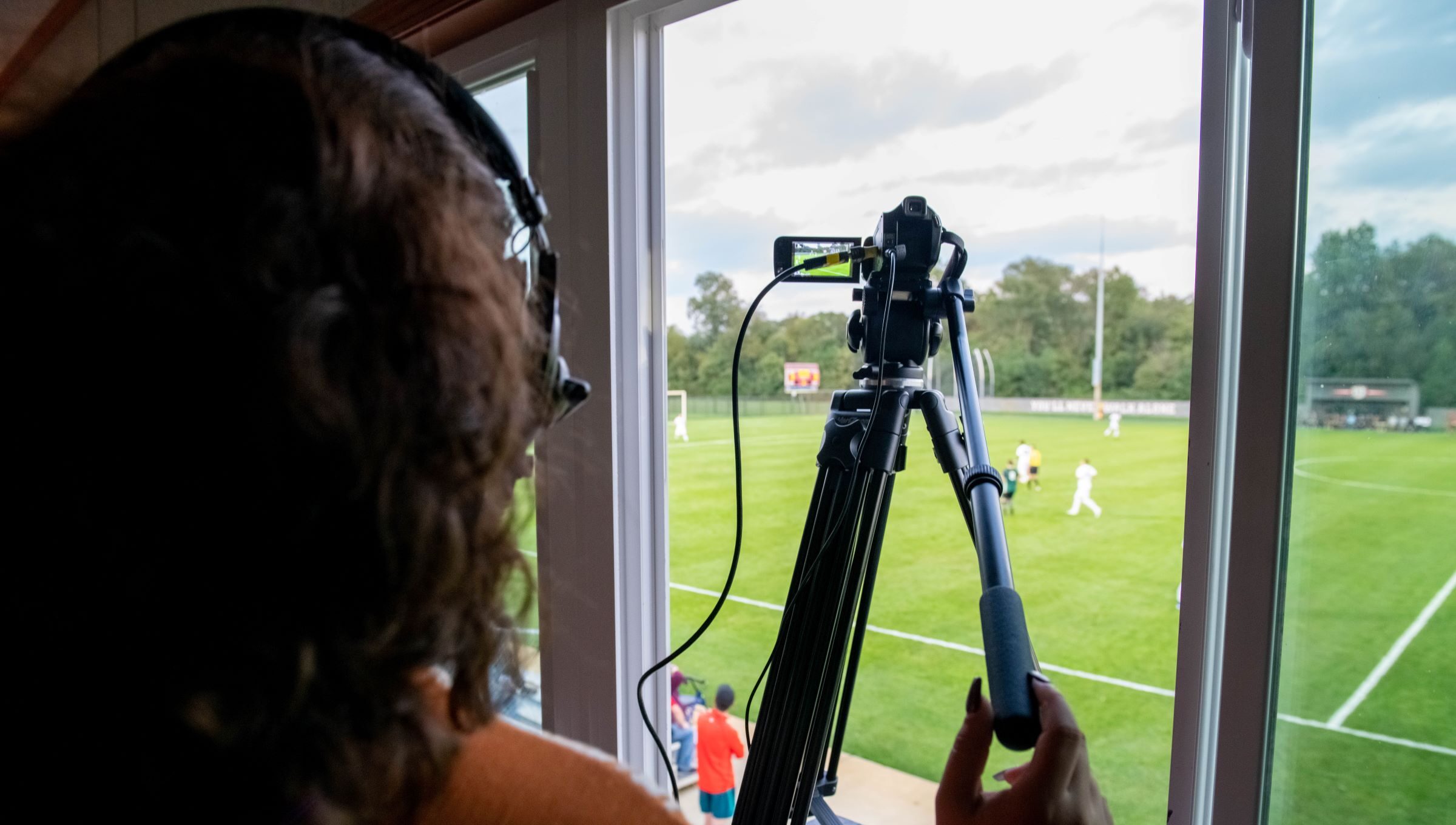 Looking for Sport Management Colleges? Grace College offers a Sport Management Degree with a Media arts and Communication Concentration. Girl Video recording soccer game.