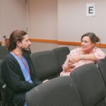 Want an online counseling master's degree? Grace College offers a clinical mental health counseling program preparing you for patient work. Two students at on-campus residency.